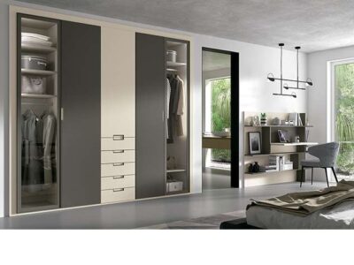 Armario con puertas plegables y cajones